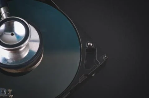 Data recovery or computer forensics concept, stethoscope dusty dismantle hard Foto stock
