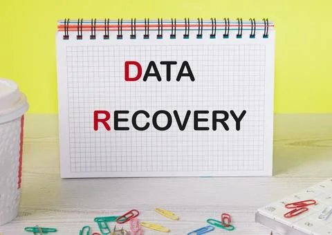 Data recovery text on a notebook sheet in a cell, word cloud concept 写真素材