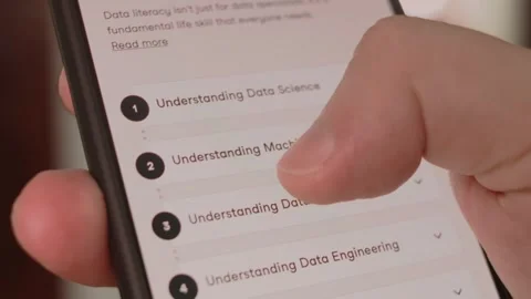 Data science. Learning information about data science on mobile screen. Stock Footage 249806294