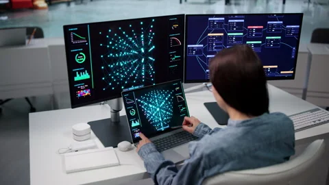 Data Scientist Analyzes Machine Learning Model Using Laptop Stock Footage 347908027