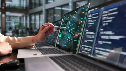 Data Scientist Analyzes Neural Network Models Using Laptop Stock Footage 337639812