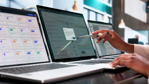 Data Scientist Analyzing AI-powered Knowledge Base On Laptop Stock Footage 339910267
