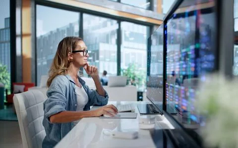 Data Scientist Analyzing Neural Network Models Using Advanced AI Tools. Stock Photos