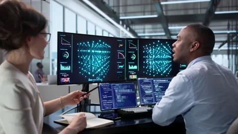 Data Scientist And Engineer Collaborate On AI Model Development Stock Footage 341003847