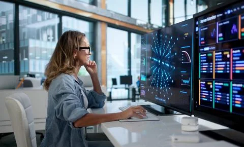Data Scientist Carefully Analyzes Neural Network Models Using Advanced Softwa Stock Photos