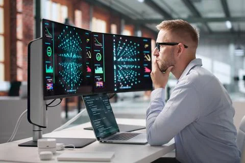 Data Scientist Carefully Codes Neural Network Models On Laptop, Analyzing Dat 스톡 사진