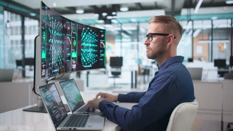 Data Scientist Carefully Develops AI Model Using Laptop Stock Footage 347283338