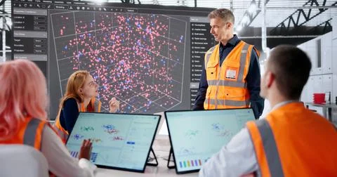 Data Scientist Leads Diverse Team Analyzing Industrial Mining Automation Syst Stock Photos