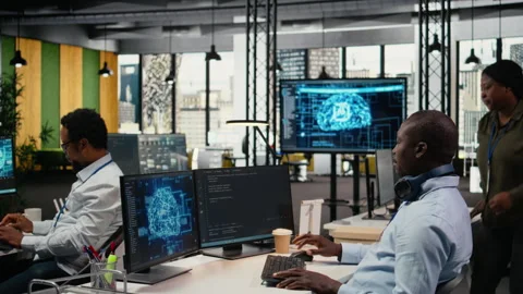 Data scientist in office doing software development to launch new features Stock Footage 322708659