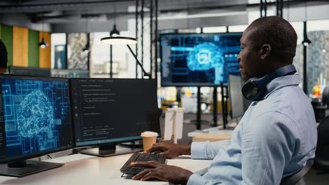 Data scientist in office doing software development to launch new features 스톡 사진