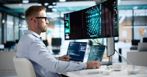 Data Scientist Trains AI Model On Laptop Using Advanced Software Tools Carefu Stock Photos