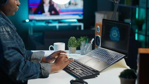 Data scientist using laptop, updating artificial intelligence machine learning Stock Photos