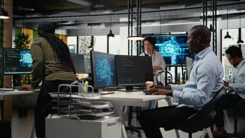 Data scientists doing brainstorming in office, using AI specialized hardware Stock Footage 323239607