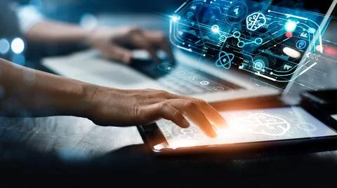 Data scientists. Programmer using laptop and tablet analyzing and development Stock Photos