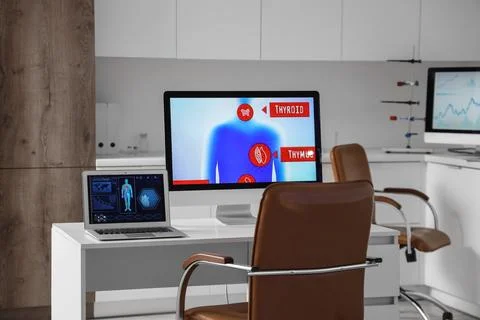 Data scientist's workplace with computer and laptop in laboratory Stock Photos