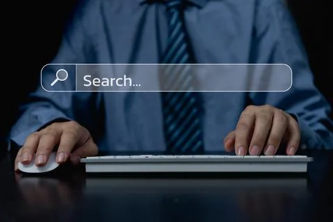 Data search Technology information concept. man hands are using a computer .. Stock Photos