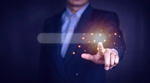 Data Search Technology Search Engine Optimization. man's hands are using a .. Stock Photos