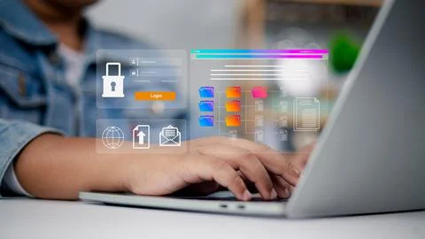 Data Security and Cloud Computing Interface. Person using a laptop with a f.. Stock Photos