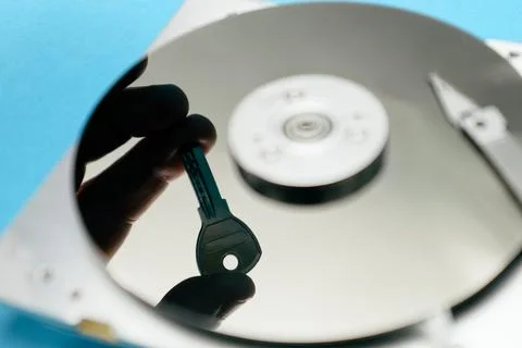 Data security concept. Cyber security concept with a padlock on hard disk. .. Stock Photos