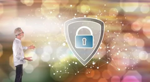 A data security concept explained by a businessman on a wall screen Stock Photos