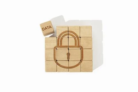 Data security concept. Wooden blocks with lock icon and data word isolated on Stockfoto's