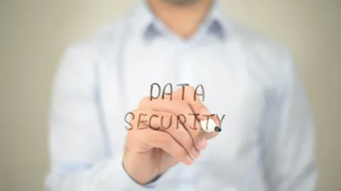 Data Security,  Man writing on transparent screen Stock Photos