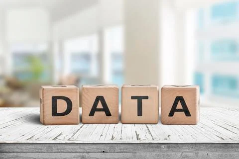 Data sign on a table with white planks Stock Photos