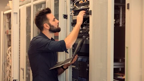 Data Storage Management.Network Engineer Fix Accounting Software App Stock Footage 150689698