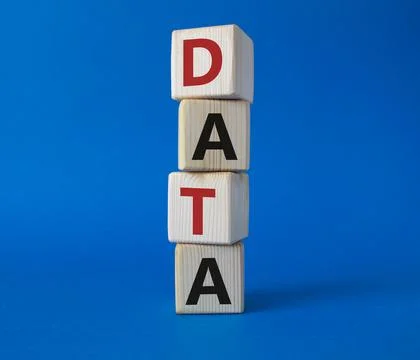 Data symbol. Concept word Data on wooden cubes. Beautiful blue background. .. 스톡 사진