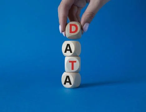 Data symbol. Concept word Data on wooden cubes. Businessman hand. Beautiful.. Stock Photos