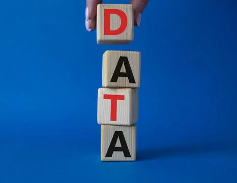 Data symbol. Concept word Data on wooden cubes. Businessman hand. Beautiful.. Stock Photos