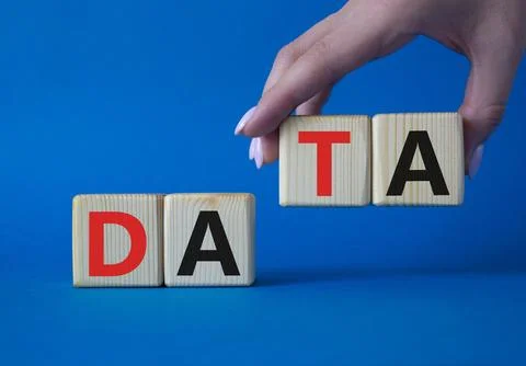 Data symbol. Concept word Data on wooden cubes. Businessman hand. Beautiful.. Stock Photos