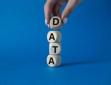 Data symbol. Concept word Data on wooden cubes. Businessman hand. Beautiful.. Stock Photos