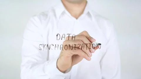 Data Synchronization, Man Writing on Glass Stock Photos