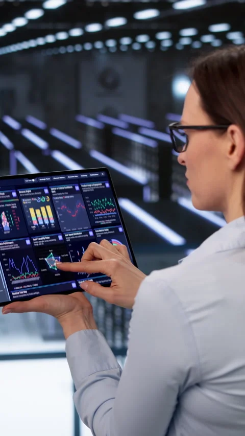 Data Technician Checks Secure Servers Carefully Stock Footage 331524994