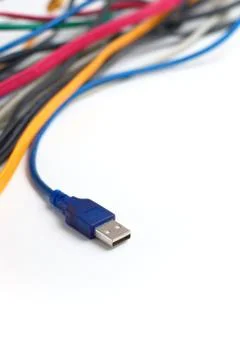 Data transfer computer connector with tangled cables on white background.  Stockfoto's