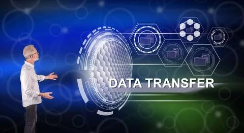 A data transfer concept explained by a businessman on a wall screen Foto stock