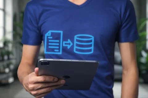 Data Transfer Concept with Tablet and Visual Elements in Office Setting Stock Photos