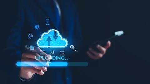 Data upload to cloud storage computing concept. Man using smartphone and co.. Stock Photos
