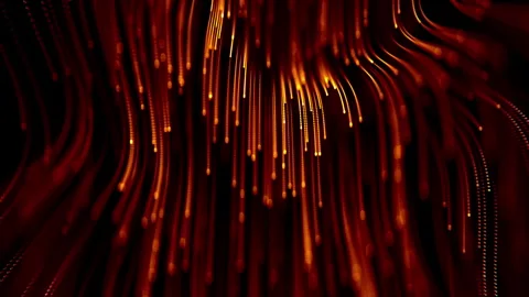 Data waterfall or digital wall. Looped. Dot terrain warm waves. Light trails Stock Footage 251828727