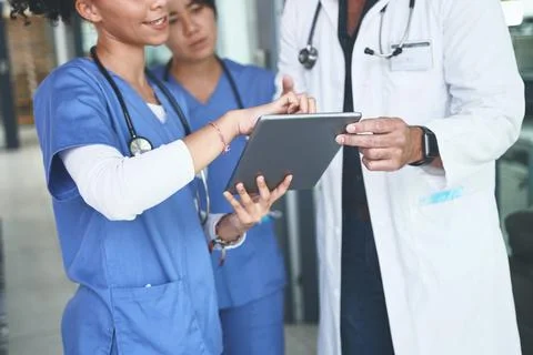 This data is what Ive been keeping my eye on. an unrecognizable doctor standing Foto stock
