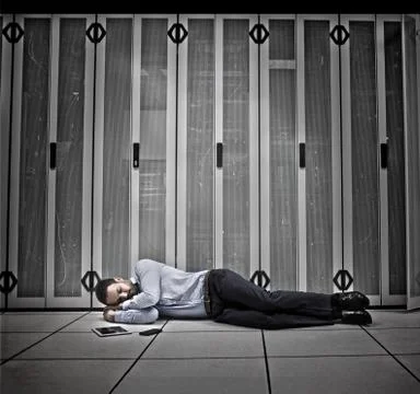 Data worker asleep on floor Illustrazione stock