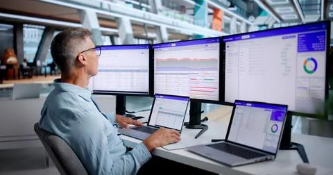 Database Administrator Analyzes Complex Query Results Carefully Using Laptop  Stock Photos