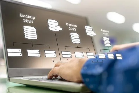 Database administrators backup company and customer data. The concept for d.. Stock Photos