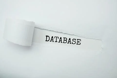 Database message written on white paper with torn paper background Stock Photos