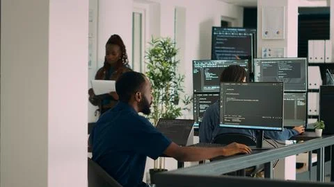 Database programer working on html script code to develop program app server Photos