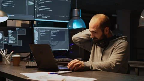 Database programer writing code and dealing with back pain Stock Photos