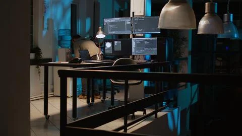 Database programmer with sore throat coughing and writing code Stock Photos