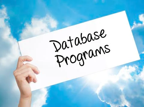 Database Programs Sign on white paper. Man Hand Holding Paper with text. Is.. Foto stock