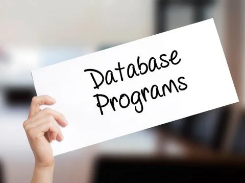 Database Programs Sign on white paper. Man Hand Holding Paper with text. Isol Foto stock